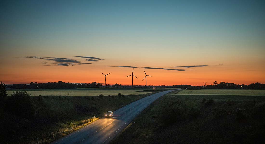 Adrian Hobbs Unsplash countryside road in sunset